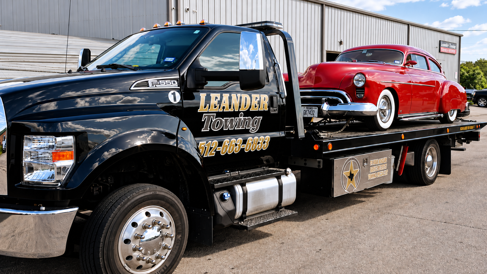 Leander Towing transporting a red classic car